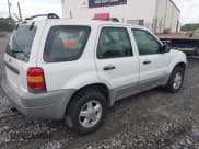 ✅ 2001 Ford Escape • VIN: 1FMYU03B51KB64348 • Lot: 42829467. Listed on IAAI with 362,807 mi. Free auction sales archive from the USA and detailed vehicle history report at DreamBid. Image 4.