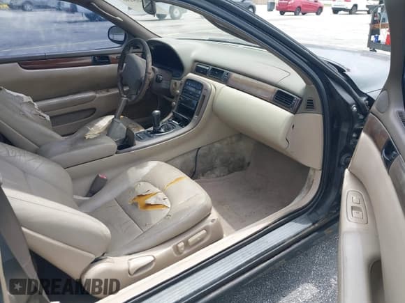 ✅ 1994 Lexus SC • VIN: JT8JZ31C5R0019241 • Lot: 42605496. Wystawiony na IAAI z przebiegiem 192 095 mil. Bezpłatny archiwum sprzedaży aukcyjnych z USA i szczegółowy raport historii pojazdu na DreamBid. Zdjęcie 5.