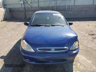 ✅ 2002 Kia Rio • VIN: KNADC123X26125297 • Lot: 74368764. Listed on Copart with 72,025 mi. Free auction sales archive from the USA and detailed vehicle history report at DreamBid. Image 5.