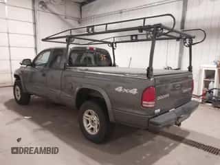 2004 Dodge Dakota Sport z VIN 1D7HG32N84S749170, wystawiony jako IAAI lot #43383681 z przebiegiem 106 840 mil mil oraz . Historia ofert i sprzedaży dostępna na DreamBid. Obrazek 3.