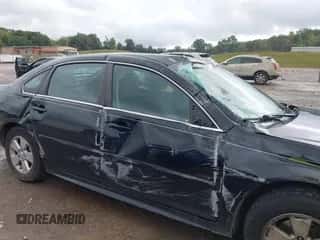 2015 Chevrolet Impala LT with VIN 2G1WB5E33F1128503, listed as a IAAI auction lot 43293233 with 121,131 mi miles and . Bid and sale history available at DreamBid. Image 6.