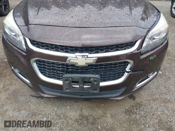 2015 Chevrolet Malibu LT z VIN 1G11D5SL0FF167535, wystawiony jako IAAI lot #43398139 z przebiegiem Nie podano mil oraz . Historia ofert i sprzedaży dostępna na DreamBid. Obrazek 6.