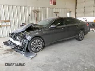 2019 Honda Accord with VIN 1HGCV3F1XKA001056, listed as a Copart auction lot 71453265 with 73,294 mi miles and Salvage title. Bid and sale history available at DreamBid. Image 1.