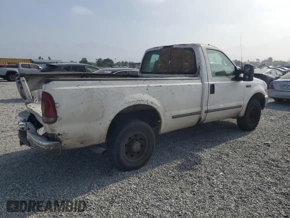 ✅ 1999 Ford F-250 XL • VIN: 1FTNF20L3XEA99923 • Lot: 58765435. Listed on Copart with 559,043 mi. Free auction sales archive from the USA and detailed vehicle history report at DreamBid. Image 3.