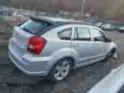 2011 Dodge Caliber Mainstreet with VIN 1B3CB3HA3BD123701, listed as a Copart auction lot 90858485 with 172,631 mi miles and Salvage title. Bid and sale history available at DreamBid. Image 3.