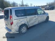 ✅ 2022 Ford Transit Connect XLT • VIN: NM0GE9F22N1515691 • Lot: 41768349. Listed on IAAI with 23,273 mi. Free auction sales archive from the USA and detailed vehicle history report at DreamBid. Image 4.