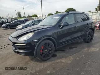 ✅ 2012 Porsche Cayenne Turbo • VIN: WP1AC2A29CLA80763 • Lot: 80086185. Listed on Copart with 123,234 mi. Free auction sales archive from the USA and detailed vehicle history report at DreamBid. Image 1.