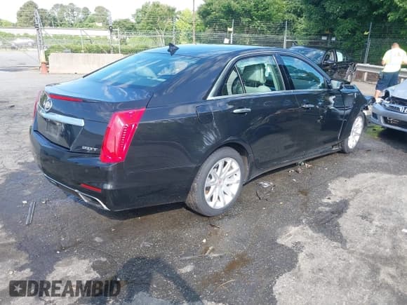 ✅ 2014 Cadillac CTS RWD • VIN: 1G6AP5SX9E0134183 • Lot: 42190674. Listed on IAAI with 59,603 mi. Free auction sales archive from the USA and detailed vehicle history report at DreamBid. Image 4.