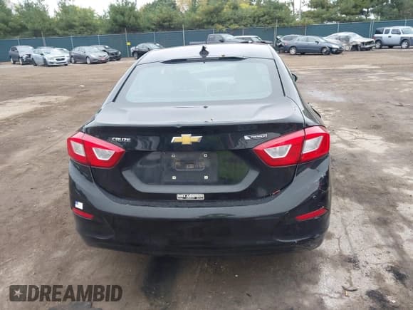 ✅ 2018 Chevrolet Cruze Premier • VIN: 1G1BF5SM1J7141701 • Lot: 43449111. Listed on IAAI with 128,825 mi. Free auction sales archive from the USA and detailed vehicle history report at DreamBid. Image 17.