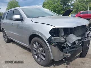 2017 Dodge Durango R/T with VIN 1C4SDJCT4HC606761, listed as a IAAI auction lot 43107117 with 87,878 mi miles and . Bid and sale history available at DreamBid. Image 1.