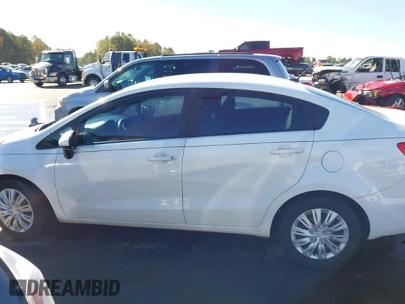 ✅ 2013 Kia Rio LX • VIN: KNADM4A30D6171661 • Лот: 43510312. Опубликован ранее на IAAI с пробегом 183 298 миль. Бесплатный доступ к архиву аукционных продаж из США и подробный отчёт об истории автомобиля на DreamBid. Изображение 14.
