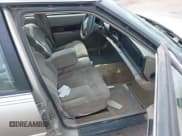 ✅ 1997 Buick LeSabre Limited • VIN: 1G4HR52K5VH565448 • Lot: 42402185. Listed on IAAI with 220,702 mi. Free auction sales archive from the USA and detailed vehicle history report at DreamBid. Image 5.