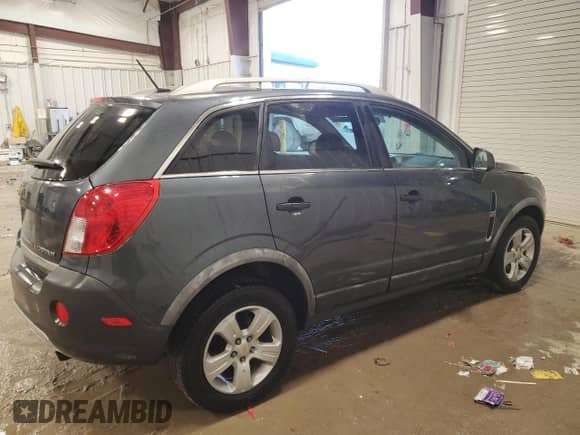 2013 Chevrolet Captiva Sport LS z VIN 3GNAL2EK7DS617127, wystawiony jako Copart lot #86716544 z przebiegiem 160 042 mil mil oraz Nie do naprawy • Non repairable. Historia ofert i sprzedaży dostępna na DreamBid. Obrazek 3.