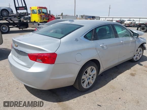 ✅ 2018 Chevrolet Impala LS • VIN: 2G11X5S3XJ9109537 • Лот: 41911686. Опубликован ранее на IAAI с пробегом 33 336 миль. Бесплатный доступ к архиву аукционных продаж из США и подробный отчёт об истории автомобиля на DreamBid. Изображение 4.