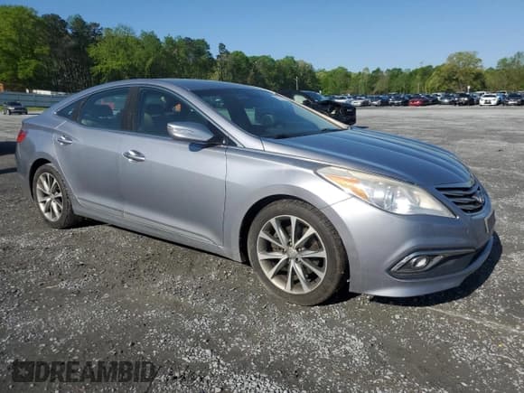 ✅ 2015 Hyundai Azera • VIN: KMHFG4JGXFA483472 • Lot: 52216745. Listed on Copart with 130,758 mi. Free auction sales archive from the USA and detailed vehicle history report at DreamBid. Image 4.