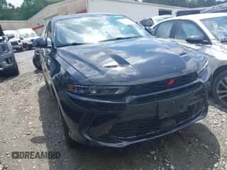 2024 Dodge Hornet R/T z VIN ZACPDFCW4R3A33071, wystawiony jako IAAI lot #42156271 z przebiegiem 25 099 mil mil oraz . Historia ofert i sprzedaży dostępna na DreamBid. Obrazek 1.