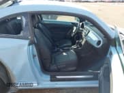 ✅ 2012 Volkswagen Beetle 2.5L • VIN: 3VWJX7AT0CM614269 • Lot: 43772516. Listed on IAAI with 129,147 mi. Free auction sales archive from the USA and detailed vehicle history report at DreamBid. Image 5.