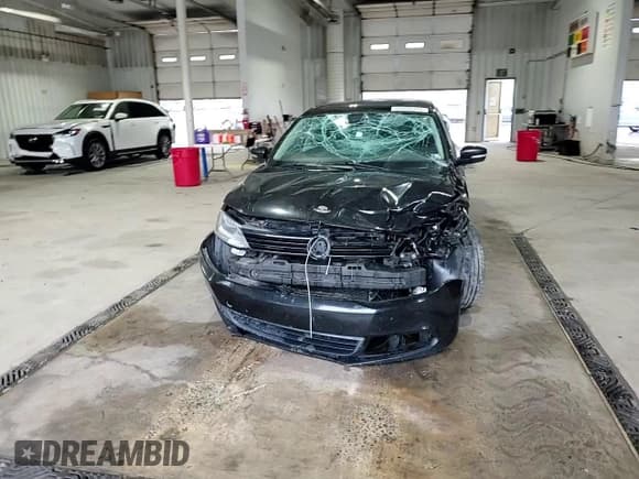 ✅ 2012 Volkswagen Jetta SE • VIN: 3VWBP7AJ3CM456495 • Lot: 69555375. Listed on Copart with 209,778 mi. Free auction sales archive from the USA and detailed vehicle history report at DreamBid. Image 13.