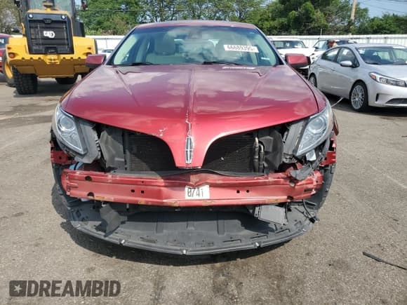 ✅ 2015 Lincoln MKS EcoBoost • VIN: 1LNHL9FT3FG606095 • Lot: 66689395. Listed on Copart with 135,198 mi. Free auction sales archive from the USA and detailed vehicle history report at DreamBid. Image 5.