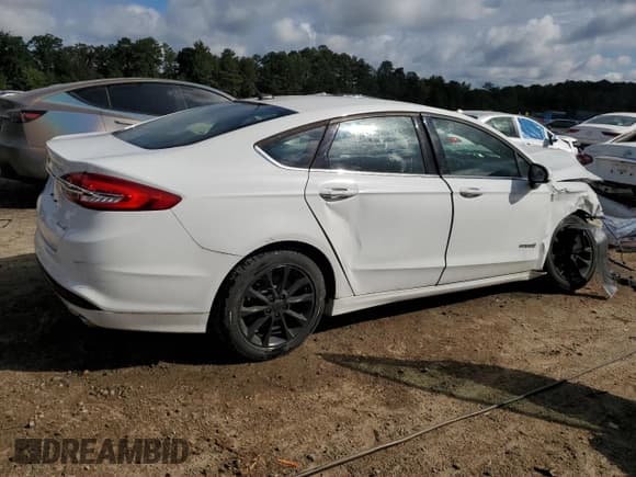 ✅ 2017 Ford Fusion Hybrid S • VIN: 3FA6P0UU0HR360678 • Lot: 85511465. Wystawiony na Copart z przebiegiem 104 755 mil. Bezpłatny archiwum sprzedaży aukcyjnych z USA i szczegółowy raport historii pojazdu na DreamBid. Zdjęcie 3.