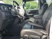 ✅ 2023 Jeep Wrangler Sahara • VIN: 1C4JJXP65PW661129 • Lot: 57599005. Listed on Copart with 46,287 mi. Free auction sales archive from the USA and detailed vehicle history report at DreamBid. Image 7.