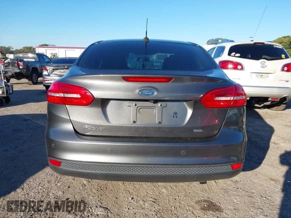 ✅ 2018 Ford Focus SEL • VIN: 1FADP3H26JL234458 • Lot: 43608310. Wystawiony na IAAI z przebiegiem 120 723 mil. Bezpłatny archiwum sprzedaży aukcyjnych z USA i szczegółowy raport historii pojazdu na DreamBid. Zdjęcie 16.