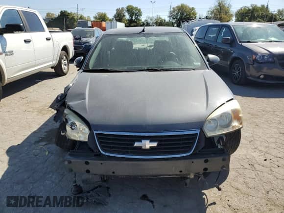 2007 Chevrolet Malibu LTZ with VIN 1G1ZU57N47F283495, listed as a Copart auction lot 75436414 with 176,977 mi miles and Salvage title. Bid and sale history available at DreamBid. Image 5.