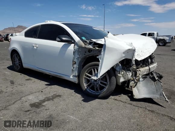 ✅ 2007 Scion tC Spec • VIN: JTKDE177170207642 • Lot: 69833375. Listed on Copart with 218,078 mi. Free auction sales archive from the USA and detailed vehicle history report at DreamBid. Image 4.