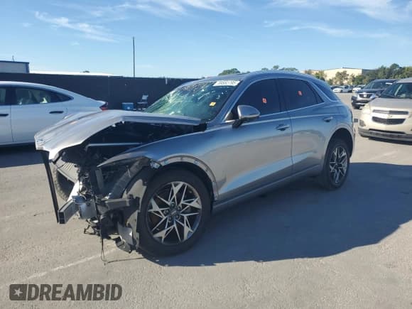 ✅ 2022 Genesis GV70 2.5T • VIN: KMUMADTB2NU046591 • Лот: 89882795. Опубликован ранее на Copart с пробегом Не указан. Бесплатный доступ к архиву аукционных продаж из США и подробный отчёт об истории автомобиля на DreamBid. Изображение 1.