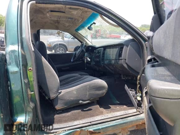 2001 Dodge Dakota Sport z VIN 1B7GG26N11S149189, wystawiony jako IAAI lot #42435137 z przebiegiem 152 363 mil mil oraz . Historia ofert i sprzedaży dostępna na DreamBid. Obrazek 5.