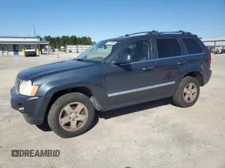 ✅ 2007 Jeep Grand Cherokee • VIN: 1J8HS68M07C701906 • Lot: 87370035. Listed on Copart with 186,681 mi. Free auction sales archive from the USA and detailed vehicle history report at DreamBid. Image 1.