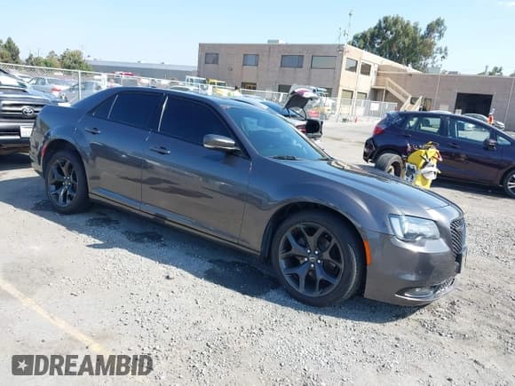 ✅ 2021 Chrysler 300 S • VIN: 2C3CCABG2MH537026 • Lot: 43061681. Listed on IAAI with 78,876 mi. Free auction sales archive from the USA and detailed vehicle history report at DreamBid. Image 1.