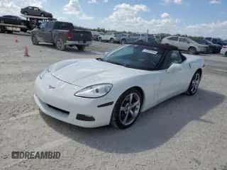 2009 Chevrolet Corvette with VIN 1G1YY36W995100373, listed as a Copart auction lot 77597944 with 71,261 mi miles and Salvage title. Bid and sale history available at DreamBid. Image 1.