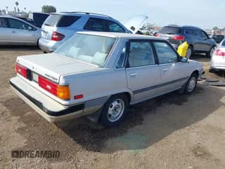 ✅ 1985 Toyota Camry LE • VIN: JT2SV16E9F0351378 • Lot: 41605627. Wystawiony na IAAI z przebiegiem 192 476 mil. Bezpłatny archiwum sprzedaży aukcyjnych z USA i szczegółowy raport historii pojazdu na DreamBid. Zdjęcie 4.
