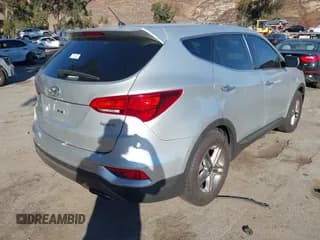 ✅ 2018 Hyundai Santa Fe 2.4L • VIN: 5XYZT3LB3JG565285 • Лот: 43486666. Опубликован ранее на IAAI с пробегом 124 869 миль. Бесплатный доступ к архиву аукционных продаж из США и подробный отчёт об истории автомобиля на DreamBid. Изображение 4.