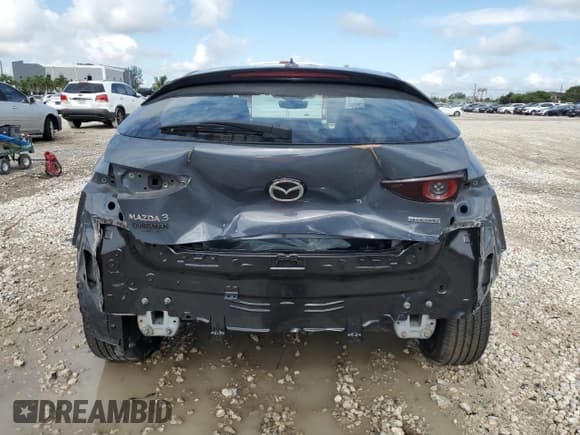 ✅ 2021 Mazda 3 Premium • VIN: JM1BPAML5M1341716 • Лот: 56893875. Опубликован ранее на Copart с пробегом 51 461 миль. Бесплатный доступ к архиву аукционных продаж из США и подробный отчёт об истории автомобиля на DreamBid. Изображение 6.