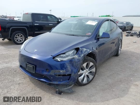 ✅ 2023 Tesla Model Y Long Range • VIN: 7SAYGDEE5PA076268 • Lot: 43140234. Wystawiony na IAAI z przebiegiem 26 918 mil. Bezpłatny archiwum sprzedaży aukcyjnych z USA i szczegółowy raport historii pojazdu na DreamBid. Zdjęcie 2.