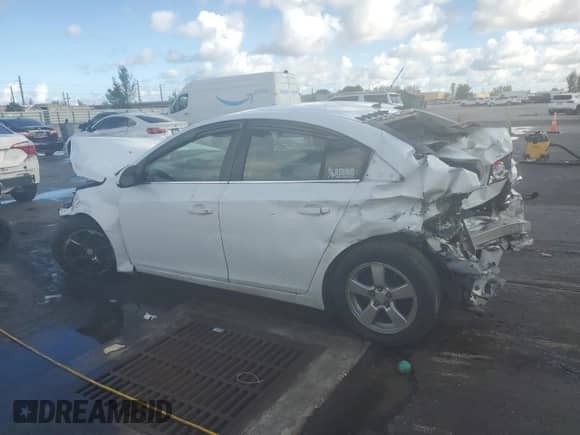 2012 Chevrolet Cruze 1FL z VIN 1G1PE5SC1C7296557, wystawiony jako Copart lot #85694375 z przebiegiem 272 865 mil mil oraz Szkoda całkowita • Salvage title. Historia ofert i sprzedaży dostępna na DreamBid. Obrazek 2.