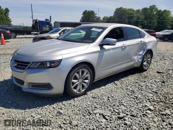 ✅ 2016 Chevrolet Impala LT • VIN: 2G1115S35G9143945 • Lot: 57400384. Wystawiony na Copart z przebiegiem 164 898 mil. Bezpłatny archiwum sprzedaży aukcyjnych z USA i szczegółowy raport historii pojazdu na DreamBid. Zdjęcie 1.