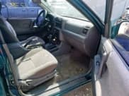 ✅ 1999 Isuzu Rodeo S • VIN: 4S2CK58W6X4366887 • Lot: 47527309. Listed on Copart with 177,199 mi. Free auction sales archive from the USA and detailed vehicle history report at DreamBid. Image 5.