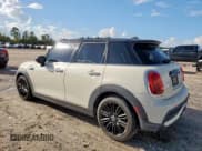 ✅ 2022 MINI Hardtop 4 Door Cooper S • VIN: WMW53DK01N2P74624 • Lot: 80210955. Listed on Copart with 58,063 mi. Free auction sales archive from the USA and detailed vehicle history report at DreamBid. Image 2.