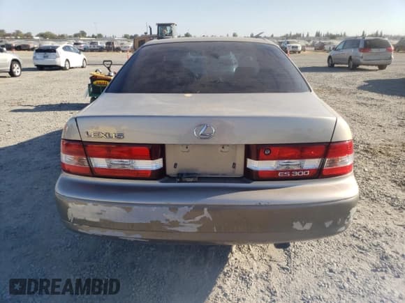 ✅ 2000 Lexus ES 300 • VIN: JT8BF28G7Y0285813 • Lot: 80011505. Listed on Copart with 143,055 mi. Free auction sales archive from the USA and detailed vehicle history report at DreamBid. Image 6.