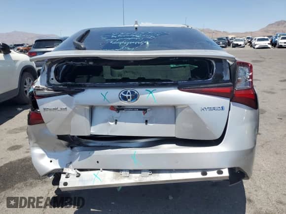 2021 Toyota Prius L Eco with VIN JTDKAMFU3M3148283, listed as a Copart auction lot 58578225 with 89,944 mi miles and Salvage title. Bid and sale history available at DreamBid. Image 6.