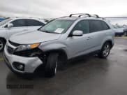✅ 2012 Kia Sorento EX • VIN: 5XYKU4A20CG209015 • Lot: 43748458. Listed on IAAI with 144,112 mi. Free auction sales archive from the USA and detailed vehicle history report at DreamBid. Image 2.