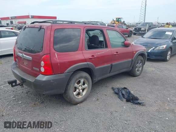 ✅ 2005 Mazda Tribute LX • VIN: 4F2YZ94135KM17267 • Lot: 43017980. Wystawiony na IAAI z przebiegiem Nie podano. Bezpłatny archiwum sprzedaży aukcyjnych z USA i szczegółowy raport historii pojazdu na DreamBid. Zdjęcie 4.