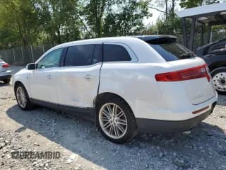 ✅ 2014 Lincoln MKT EcoBoost • VIN: 2LMHJ5AT4EBL57905 • Лот: 64424994. Опубликован ранее на Copart с пробегом 99 892 миль. Бесплатный доступ к архиву аукционных продаж из США и подробный отчёт об истории автомобиля на DreamBid. Изображение 2.