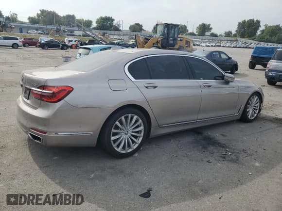 ✅ 2017 BMW 7 Series 740i • VIN: WBA7E2C3XHG741287 • Lot: 81467345. Listed on Copart with 112,218 mi. Free auction sales archive from the USA and detailed vehicle history report at DreamBid. Image 3.