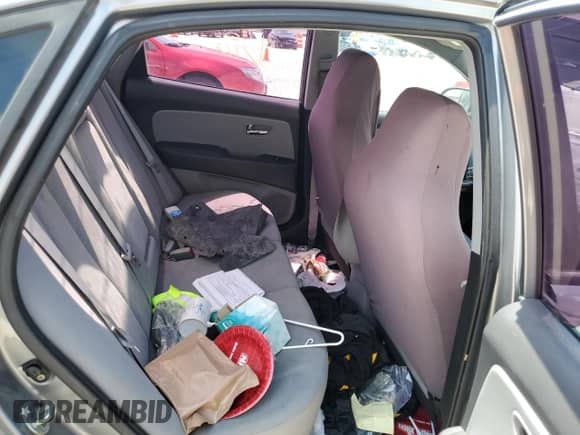 2010 Hyundai Elantra GLS z VIN KMHDU4ADXAU136737, wystawiony jako Copart lot #63348684 z przebiegiem 169 426 mil mil oraz Szkoda całkowita • Salvage title. Historia ofert i sprzedaży dostępna na DreamBid. Obrazek 10.