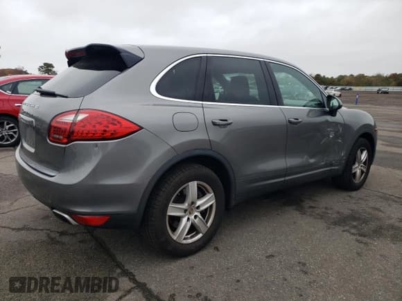✅ 2014 Porsche Cayenne • VIN: WP1AA2A22ELA95985 • Лот: 90595065. Опубликован ранее на Copart с пробегом 66 800 миль. Бесплатный доступ к архиву аукционных продаж из США и подробный отчёт об истории автомобиля на DreamBid. Изображение 3.