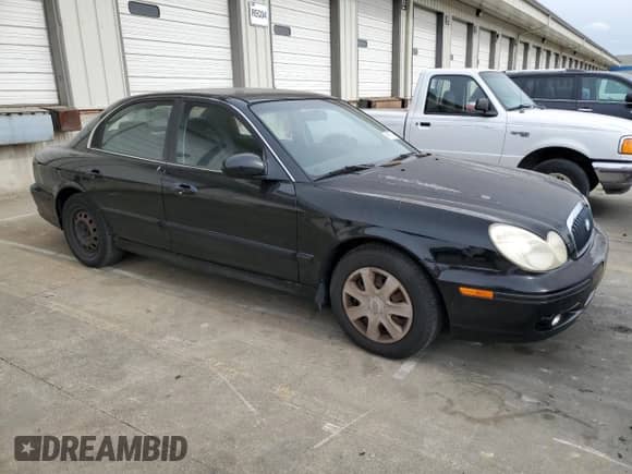 2004 Hyundai Sonata with VIN KMHWF25S24A969552, listed as a Copart auction lot 76101794 with 136,255 mi miles and Salvage title. Bid and sale history available at DreamBid. Image 4.